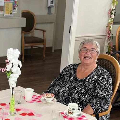 Senior seated enjoying some tea