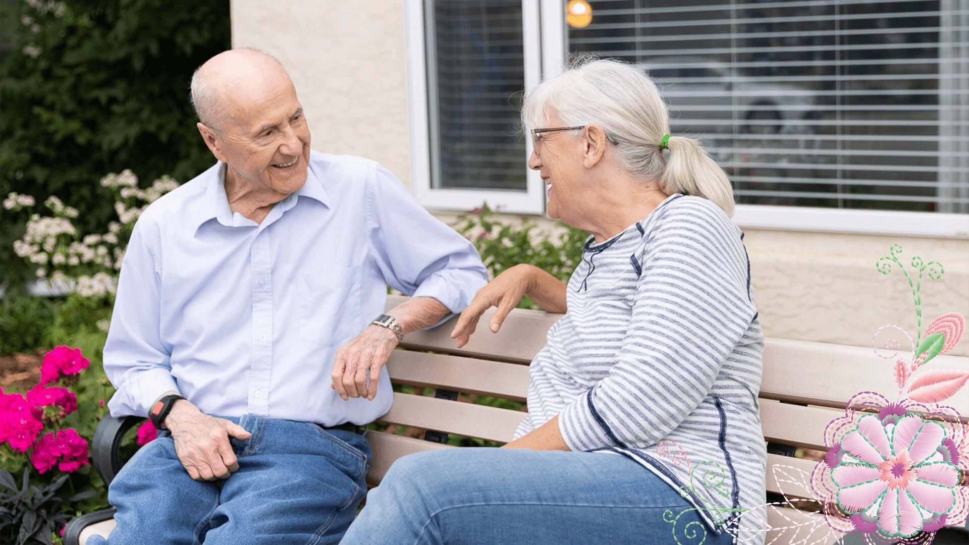 A happy elderly couple cuddling in Country cottage's garden