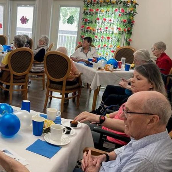 Seniors all seated together celebrating Father's Day